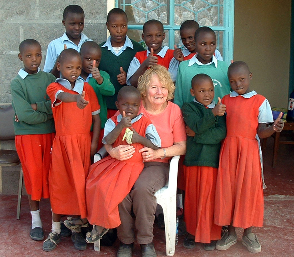 Ann with children on 2006 trip to Kenya